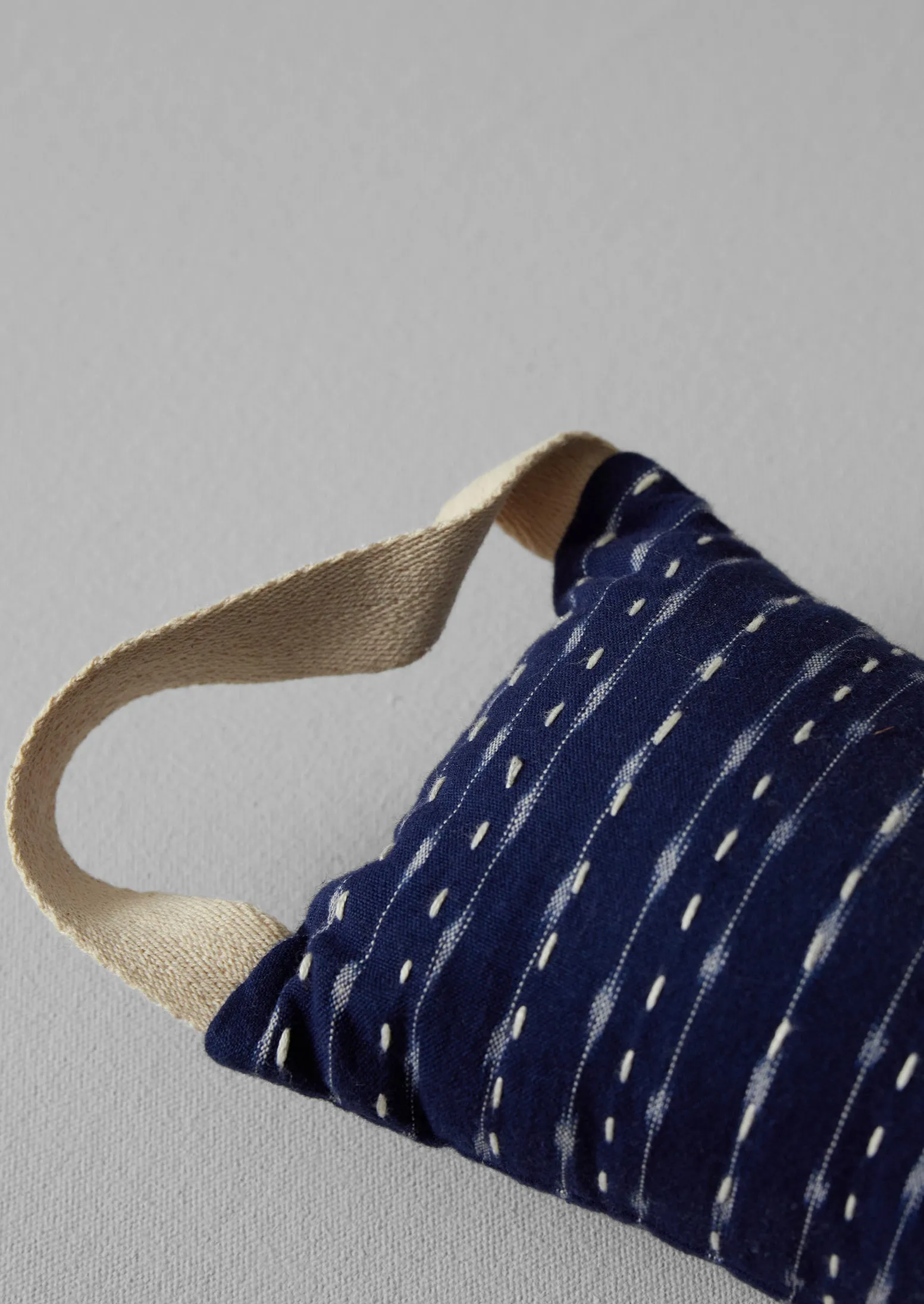 Hand Woven Ikat Cotton Draught Excluder | Midnight Stripe